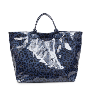 Large dark blue leopard print tote bag with glossy finish and white TOTE BAG text