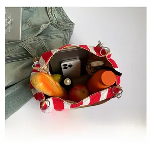 Top view of red and white striped tote bag showing large capacity for daily essentials