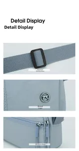 Detail of adjustable strap and SBS metal zippers on a light blue puffer crossbody bag