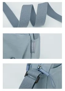 Detail view of high-density nylon shoulder strap and Chenpai logo on the crossbody bag
