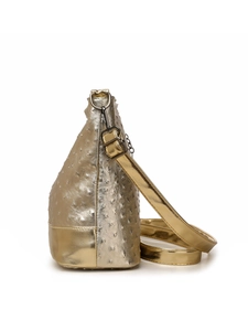 Detail of gold ostrich pattern texture and smooth metal hardware on Boston bag