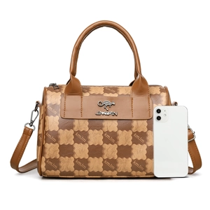Brown checkered Boston style tote bag with gold kangaroo hardware and leather strap