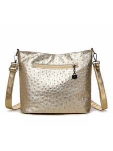 Golden ostrich textured Boston shoulder bag with back zipper and adjustable strap