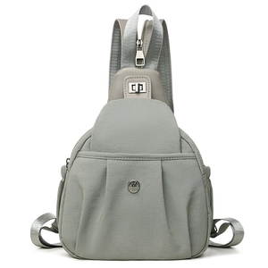 Grey waterproof oxford cloth backpack and chest bag with pleated design and metal logo