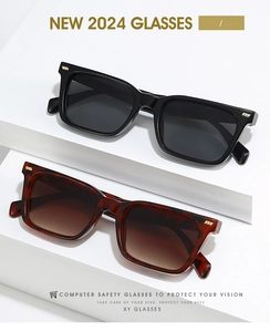 Detail of square vintage sunglasses in black and tortoise shell on geometric white stand