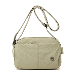 Olive green lightweight puffer shoulder bag with adjustable strap and nylon texture