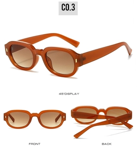 Three-angle views of amber oval sunglasses with gradient lenses and rivet details