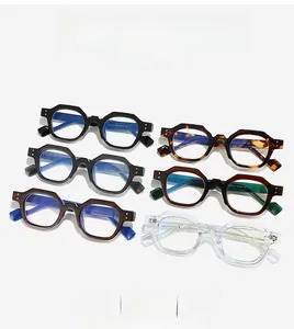 Detailed display of chunky polygonal sunglasses in six assorted colors on a white background