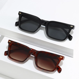 Classic square sunglasses in black and tortoiseshell finish with gold metal logo accents