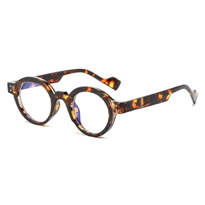Retro round tortoise shell blue light blocking glasses with stylish metal rivet accents