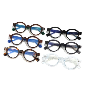 Retro round anti-blue light glasses in various colors like tortoiseshell and black