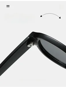 Macro shot of durable metal hinges and reinforced screw structure on black sunglasses