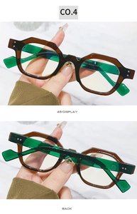 Detail view of tortoiseshell frames and translucent green temples with CE mark engraving