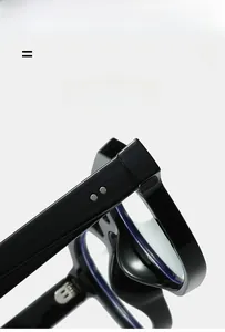 Detail of premium black square sunglasses frame showing durable metal hinges and silver rivets