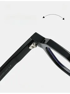 Close-up of durable metal hinge and CE marking on black thick frame sunglasses