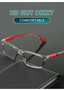 Detail of grey rectangle frame glasses with contrasting red non-slip temple tips