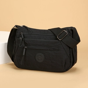 Multi-pocket black waterproof nylon crossbody bag with adjustable wide shoulder strap