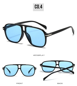 Detail view of double bridge aviator sunglasses with black frame and light blue lenses