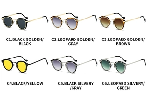 Matrix display of oval sunglasses with metallic frames in six different color combinations