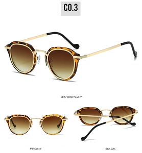 Detailed views of tortoise shell oval sunglasses with gold bridge and gradient lenses