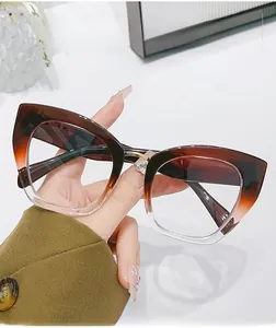 Detail of cat-eye gradient glasses frame with rice nail accents and anti-blue light lenses