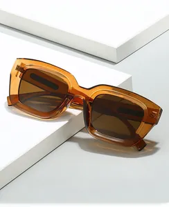 Detail of amber tortoiseshell square frame sunglasses with durable metal hinges