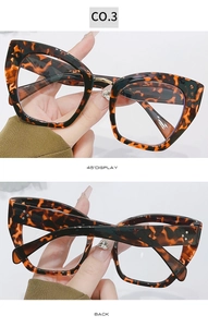 Detail view of tortoiseshell cat-eye glasses frame with metal rivets and sturdy hinges