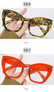 Detail of oversized cat-eye anti-blue light glasses in tortoise and translucent red