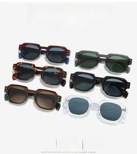 Flat lay of vintage square sunglasses in various tortoise and solid colors with colorful lenses