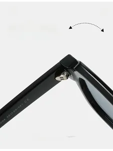 Macro shot of durable metal hinge and CE certification mark on black square sunglasses