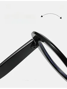 Detail of durable metal hinge on oversized black round frame sunglasses for fashion