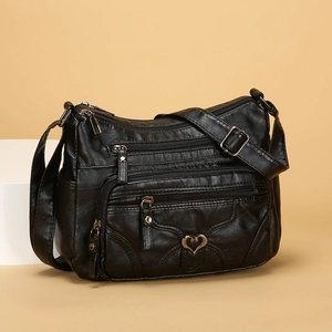 Sac bandoulière en cuir PU souple noir avec poches zippées et boucle en métal cœur
