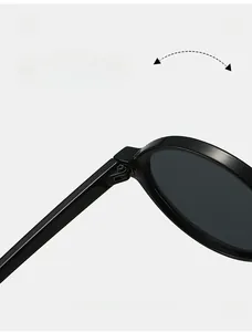 Macro shot of durable metal hinges on black modern frame sunglasses for women