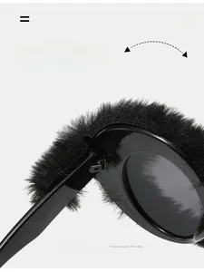 Detail shot of durable metal hinge on stylish plush oval sunglasses with black fur