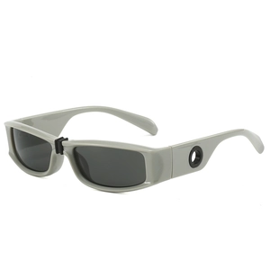 Futuristic retro square sunglasses with wide temples and side circular cutout details