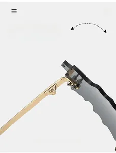 Detail of durable gold metal hinge and wave-cut edge on rimless maple leaf sunglasses