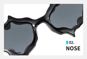 Close-up of the irregular wavy nose bridge design on black Y2K punk sunglasses