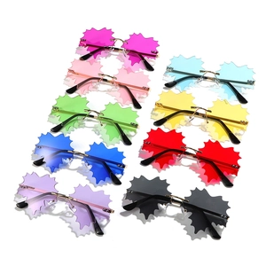 Frameless rimless sunglasses with maple leaf shaped lenses in ten assorted vibrant colors