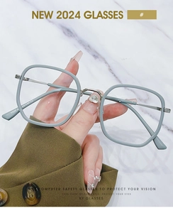 Detailed close-up of grey square eyeglass frames showing model 9507 and CE certification mark