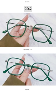 Detail of green square glasses frame showing model 9507 and metal temple on marble background