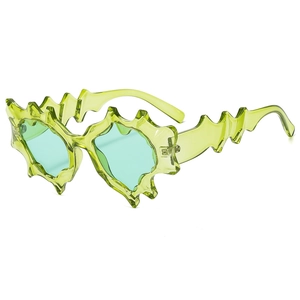 Futuristic Y2K punk sunglasses with irregular neon green frames and tinted lenses