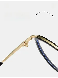 Macro detail of a durable golden metal hinge on black square-frame glasses