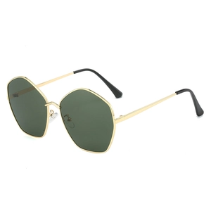Irregular hexagon sunglasses with gold metal frame and dark green lenses in white background