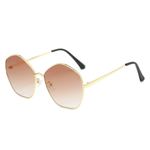 Modern irregular geometric sunglasses with gold metal frames and brown gradient lenses