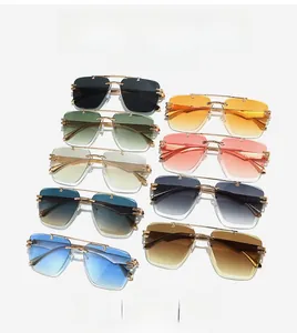 Detailed grid of rimless sunglasses with gradient lenses and gold metal frames