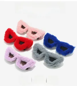 Detailed view of colorful plush-trimmed cat-eye sunglasses in various vibrant fur shades