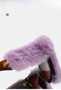 Detail of creative cat-eye sunglasses with purple faux fur trim and tortoiseshell temples