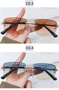 Detail view of oversized rimless square sunglasses with crystals and gradient lenses