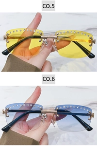 Detail of rimless sunglasses with rhinestone edges in yellow and blue gradient colors