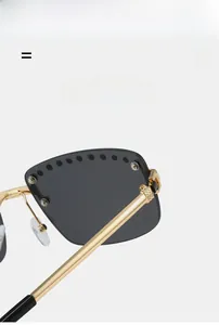 Detail of rimless sunglasses with rhinestone trim and ultra-light gold metal temples
